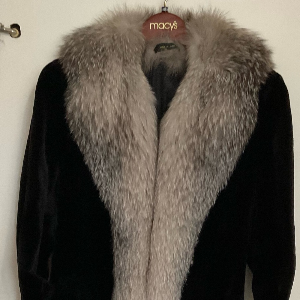 Beautiful mink coat with blue fox collar that runs down. Very warm, light, cozy